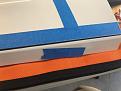 Tip aileron jigged for sanding, and sub-TE marked with tape to define proper overhang.