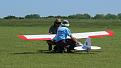 â€¢	Gene and Cody getting his tow plane ready for the day